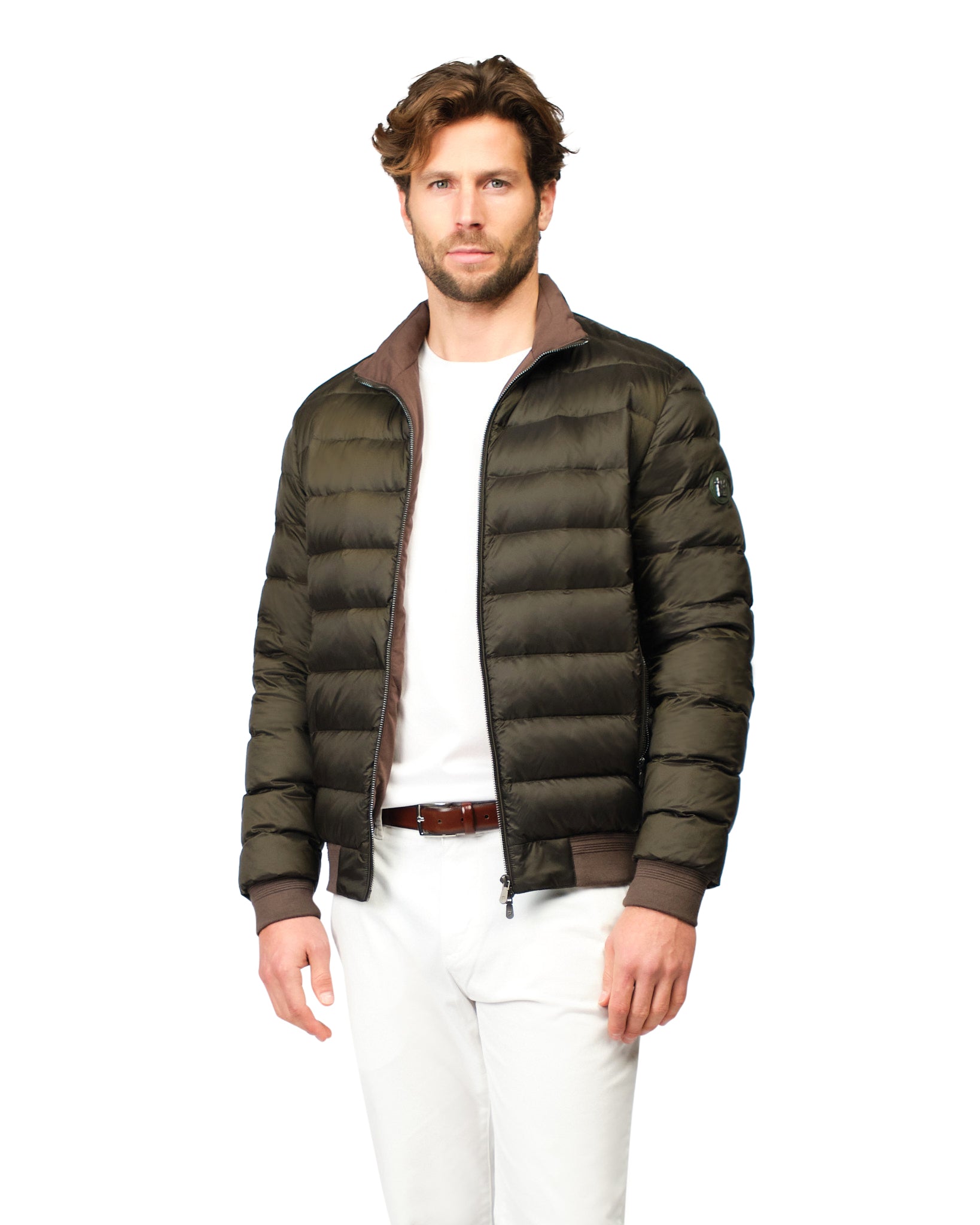 Man wearing a green puffer jacket on a white background