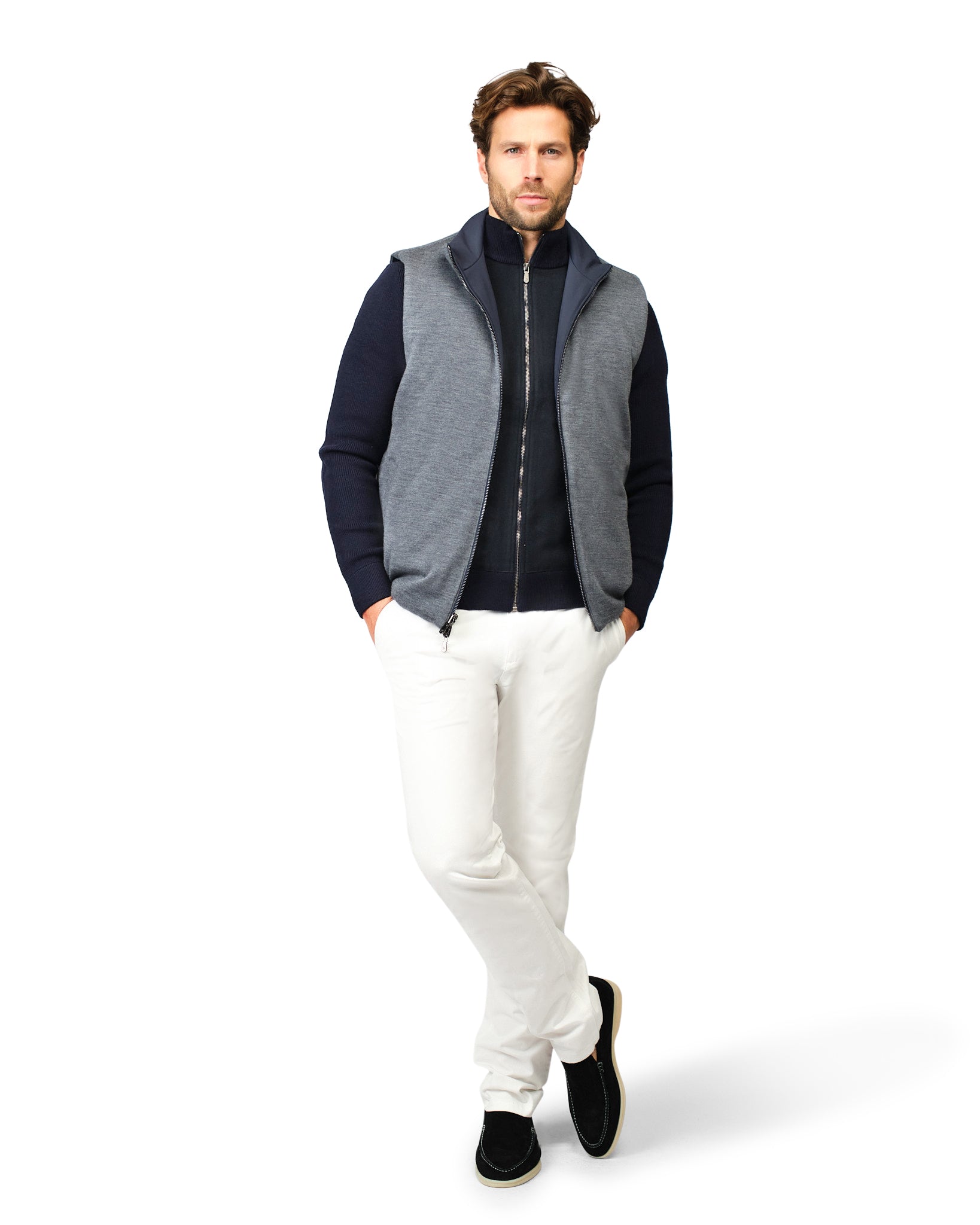 Man wearing a two-tone jacket with a white background