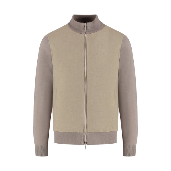 Beige and brown zip-up sweater on a white background