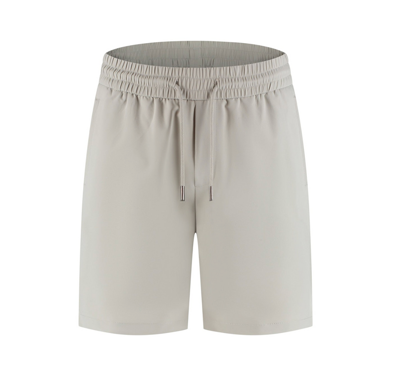 Beige shorts with an elastic waistband on a white background