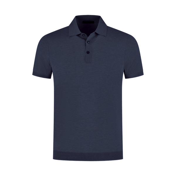 Navy blue polo shirt on a white background