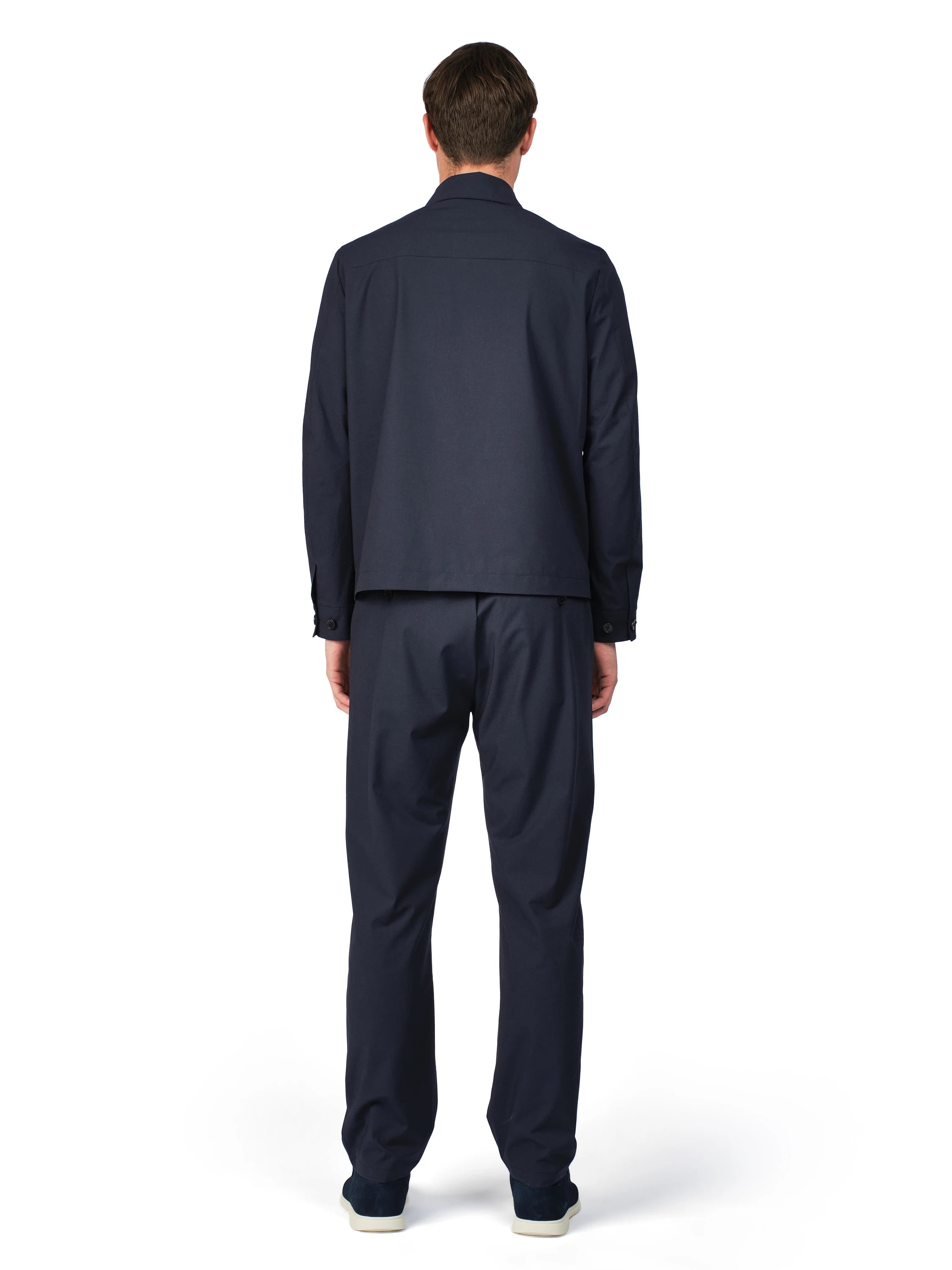 Man wearing a navy blue suit on a white background
