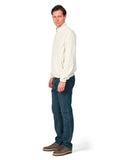Man wearing a white shirt and blue jeans on a white background