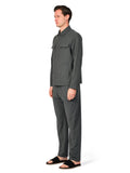 Man wearing a gray outfit on a white background