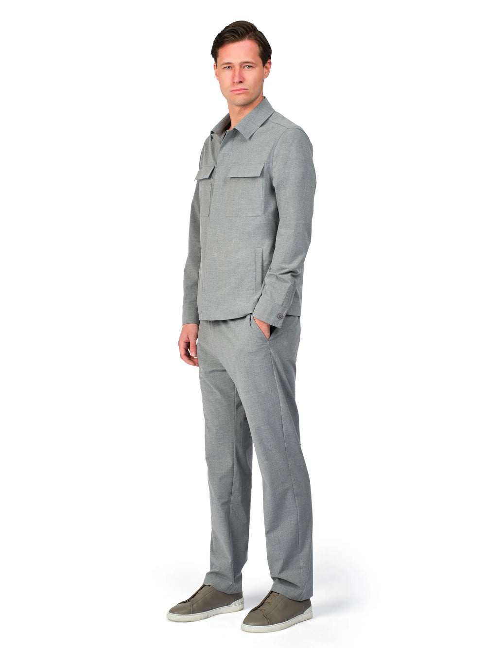 Man wearing a gray suit on a white background