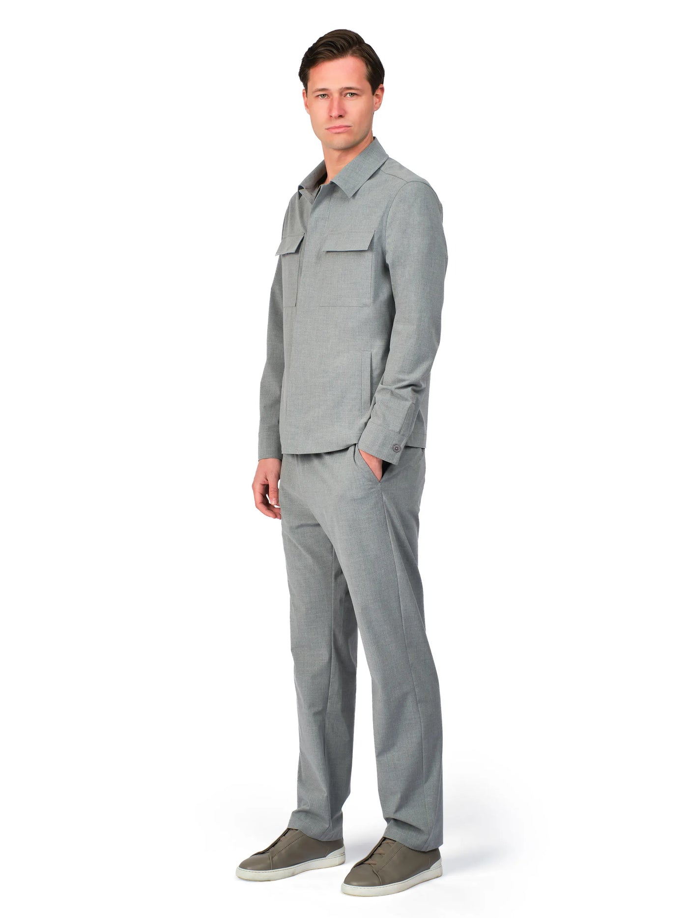 Man wearing a gray suit on a white background