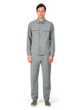 Man wearing a gray outfit on a white background