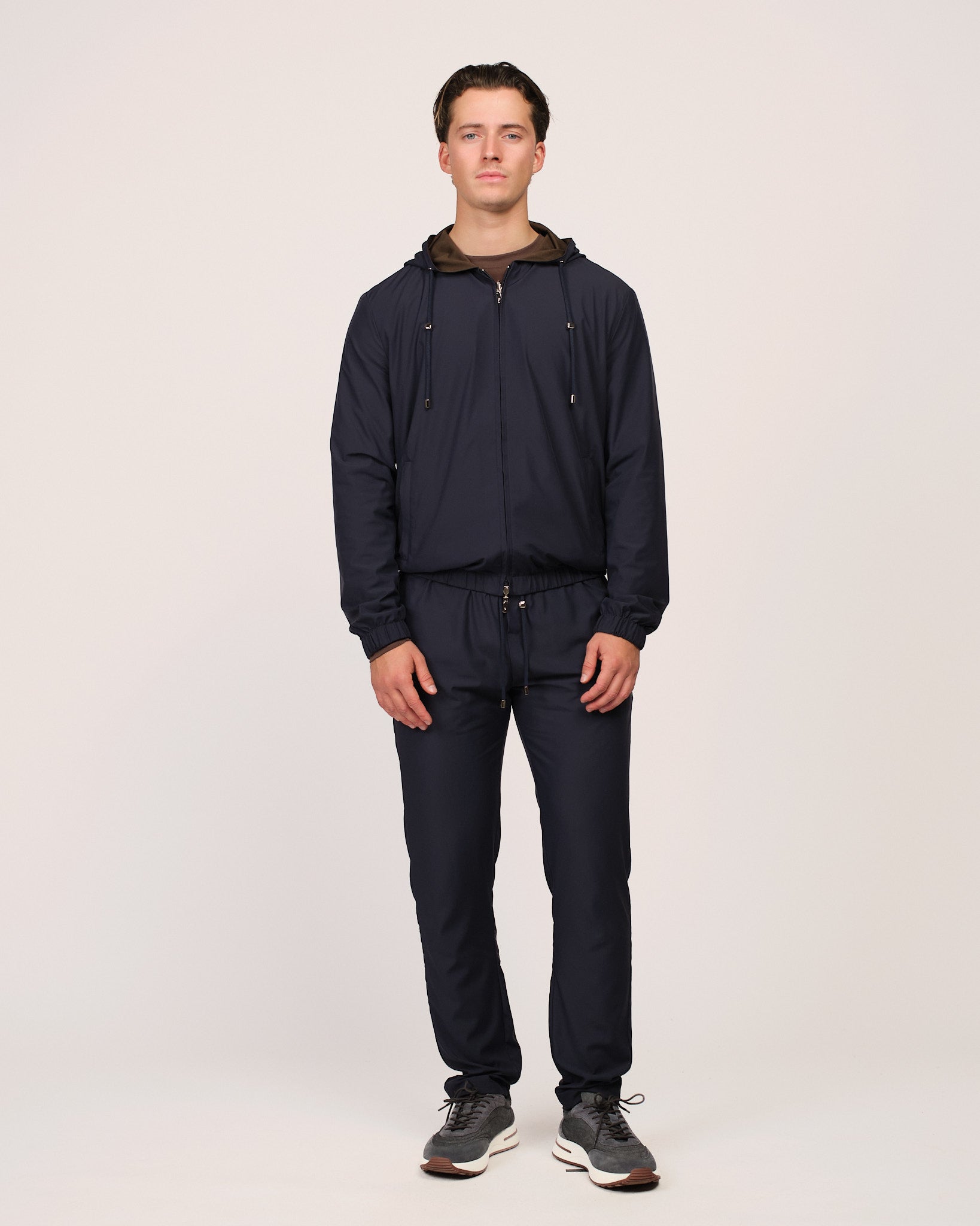 The Reversible Tech Suit Navy Brown