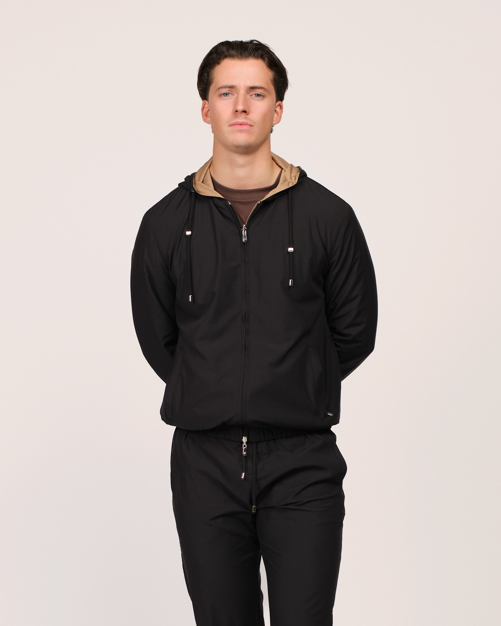 The Reversible Tech Suit Black Beige