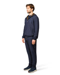 Man wearing a navy blue outfit on a white background