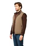 Man wearing a brown and beige vest on a white background