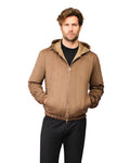 Man wearing a brown jacket on a white background