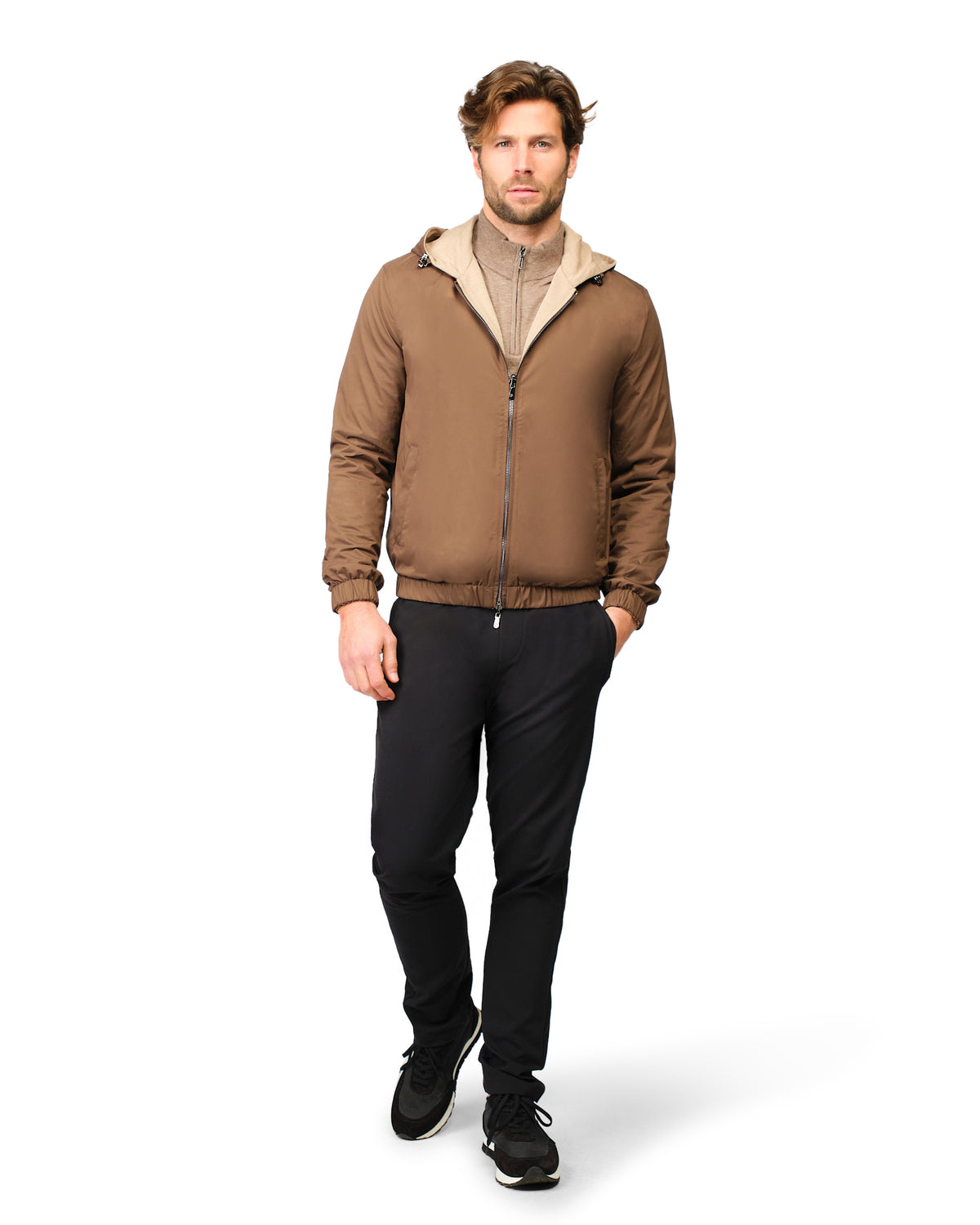 Man wearing a brown jacket with a white background