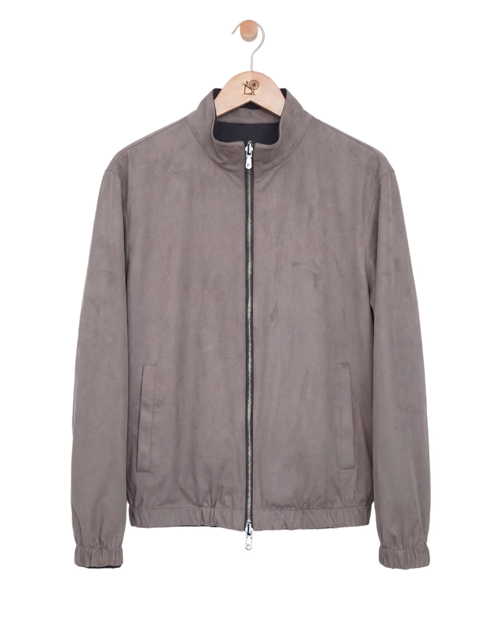 Gray jacket on a hanger against a white background