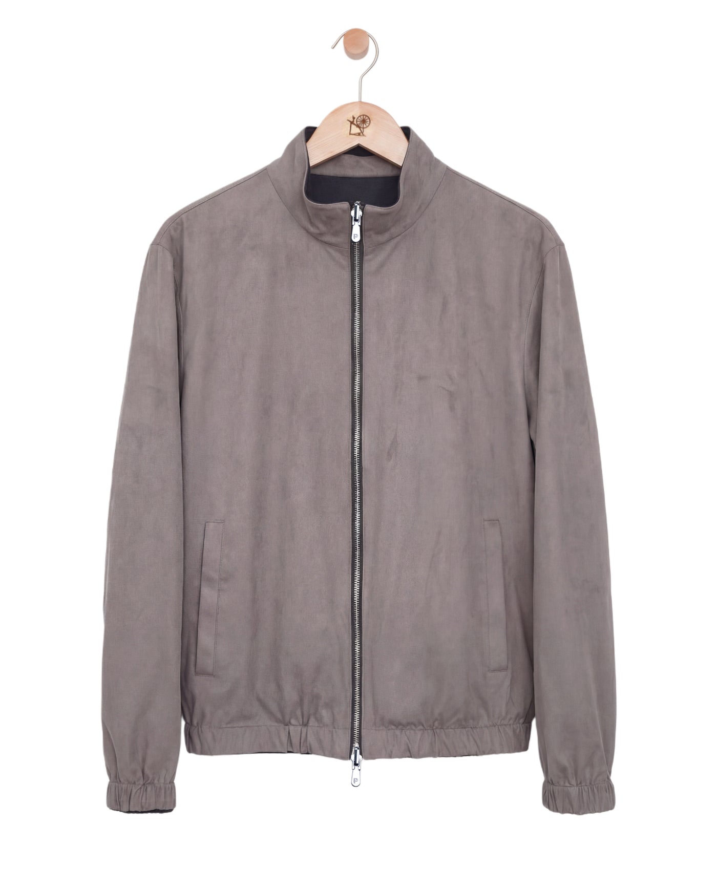 Gray jacket on a hanger against a white background