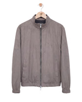Gray jacket on a hanger against a white background