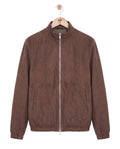 Brown jacket on a hanger against a white background