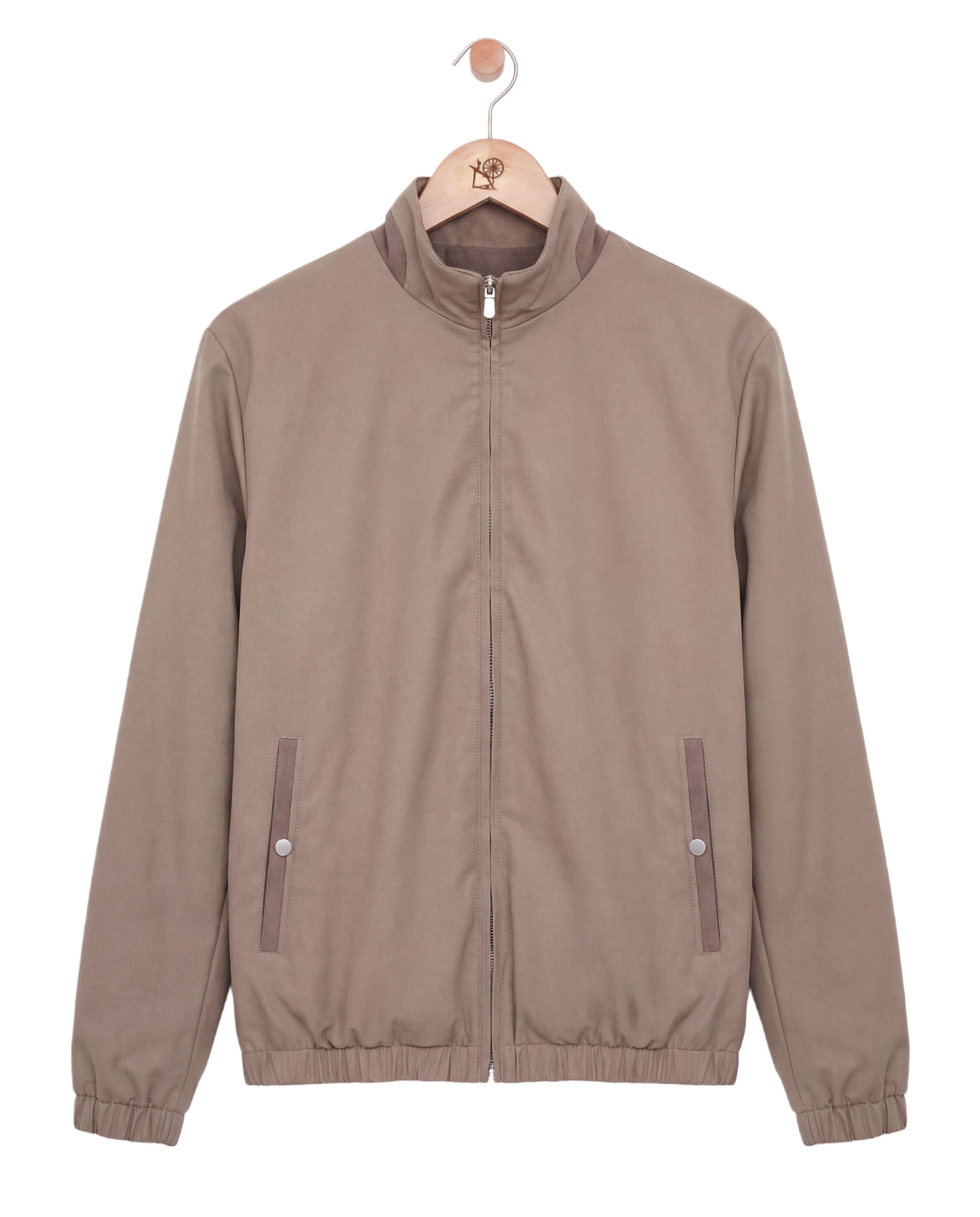 Brown jacket on a hanger against a white background