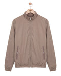 Brown jacket on a hanger against a white background