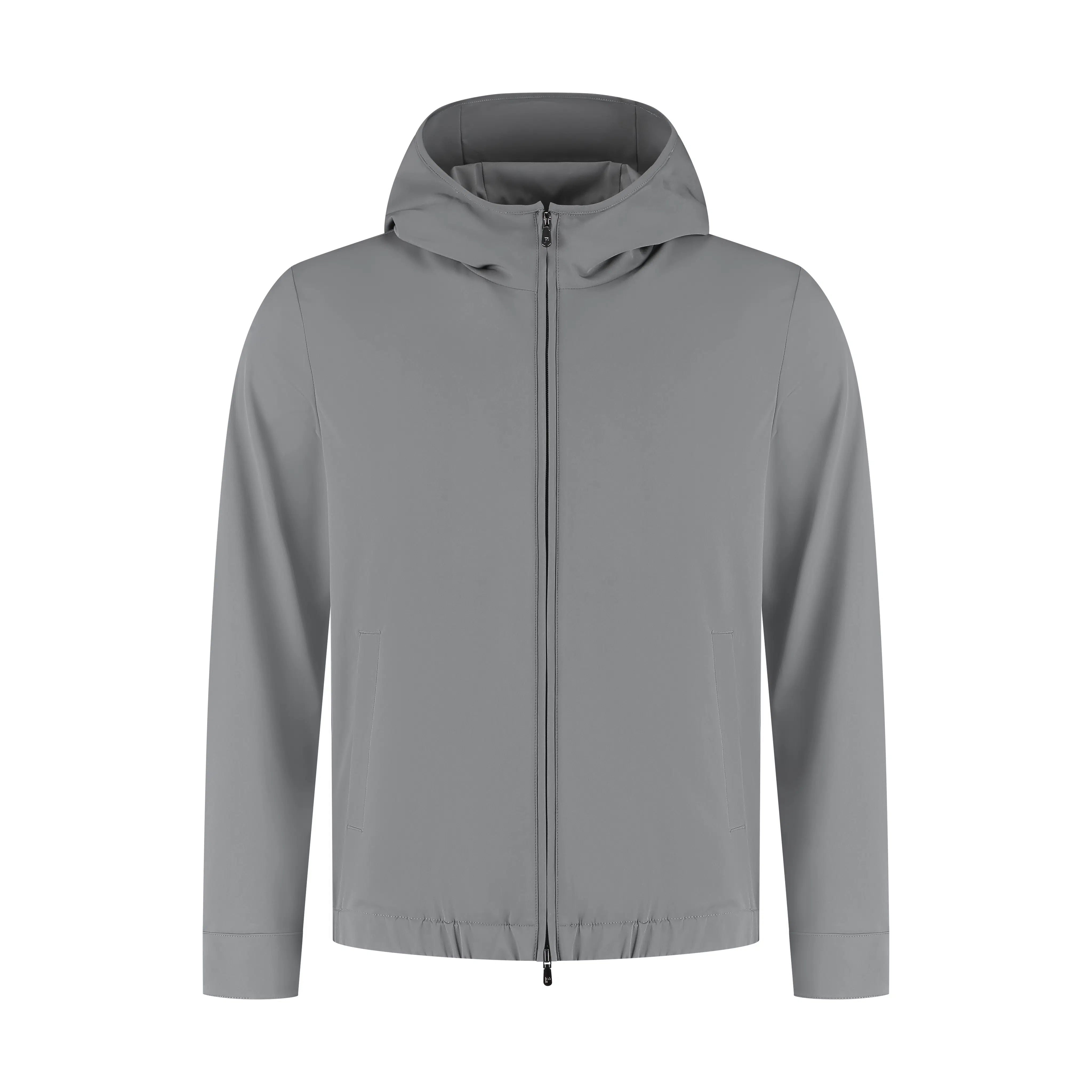 Men's grey hooded tech jacket with stylish fit, lightweight casual outdoor wear style
