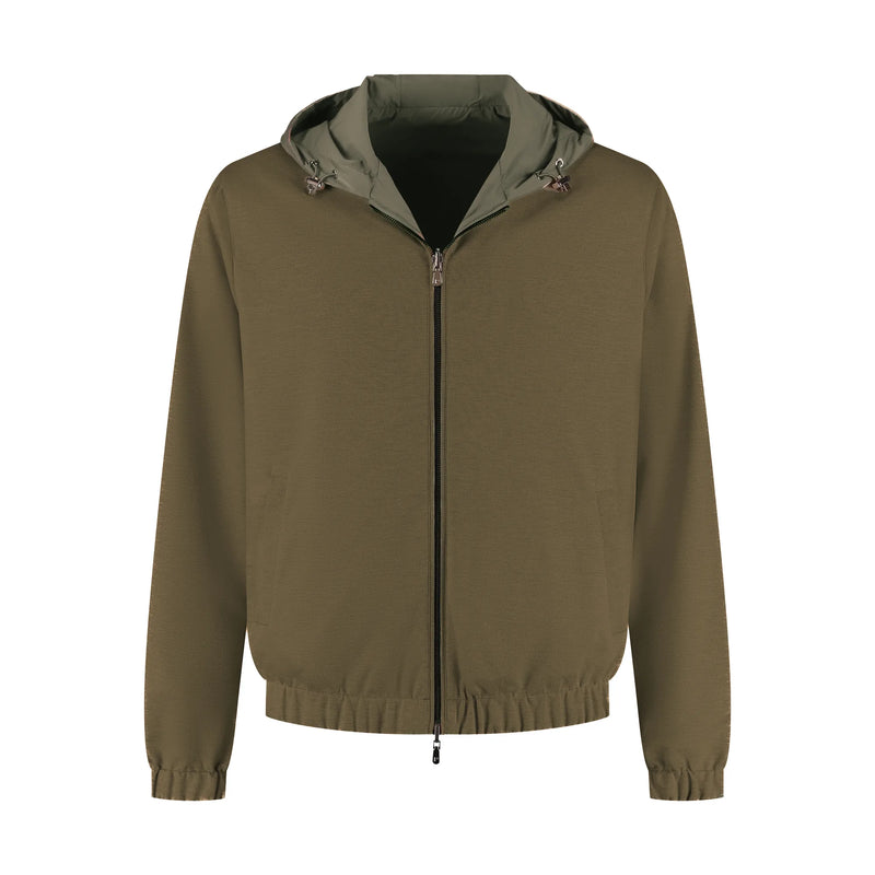 Green jacket with a hood on a white background