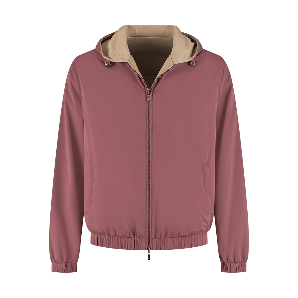 Pink jacket with beige hood on a white background