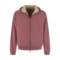 Pink jacket with beige hood on a white background