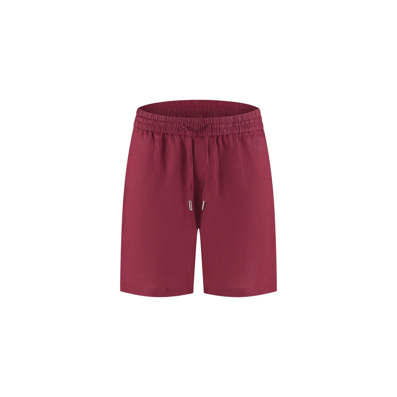 Maroon shorts on a white background