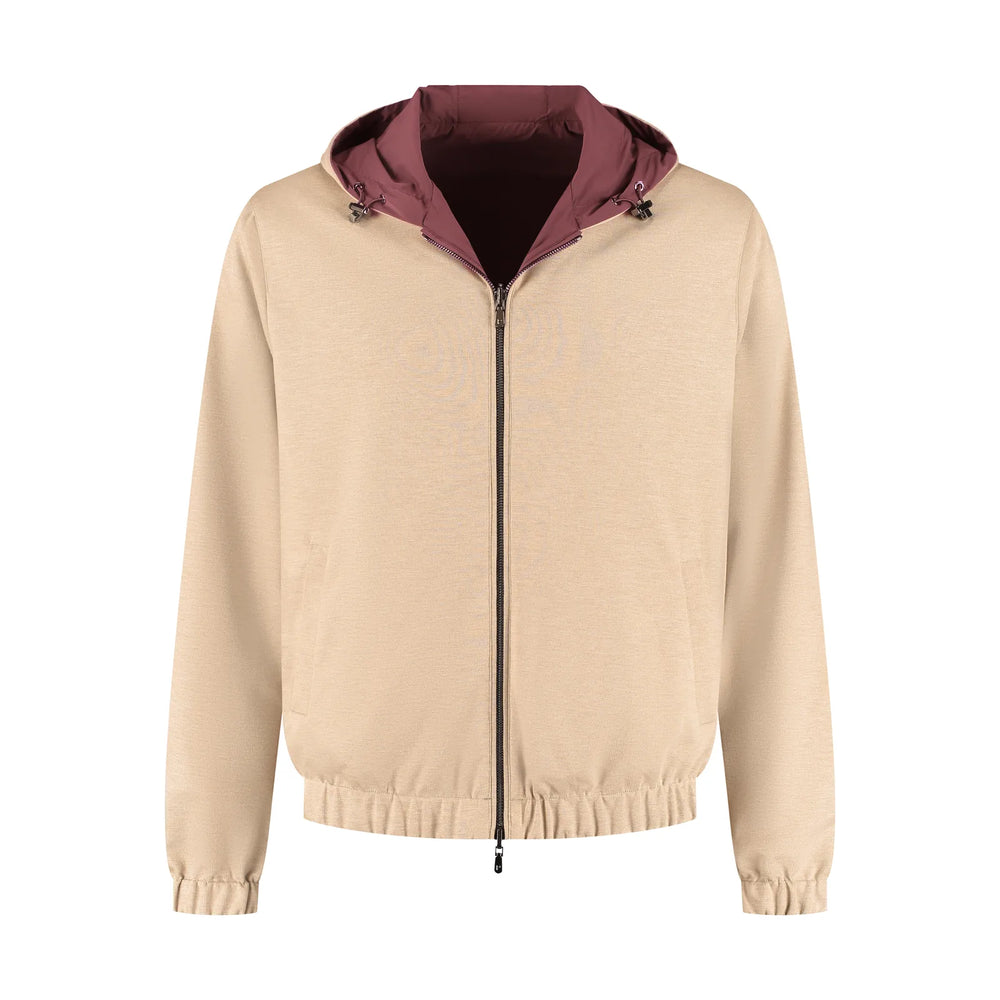 Beige jacket with a maroon hood on a white background