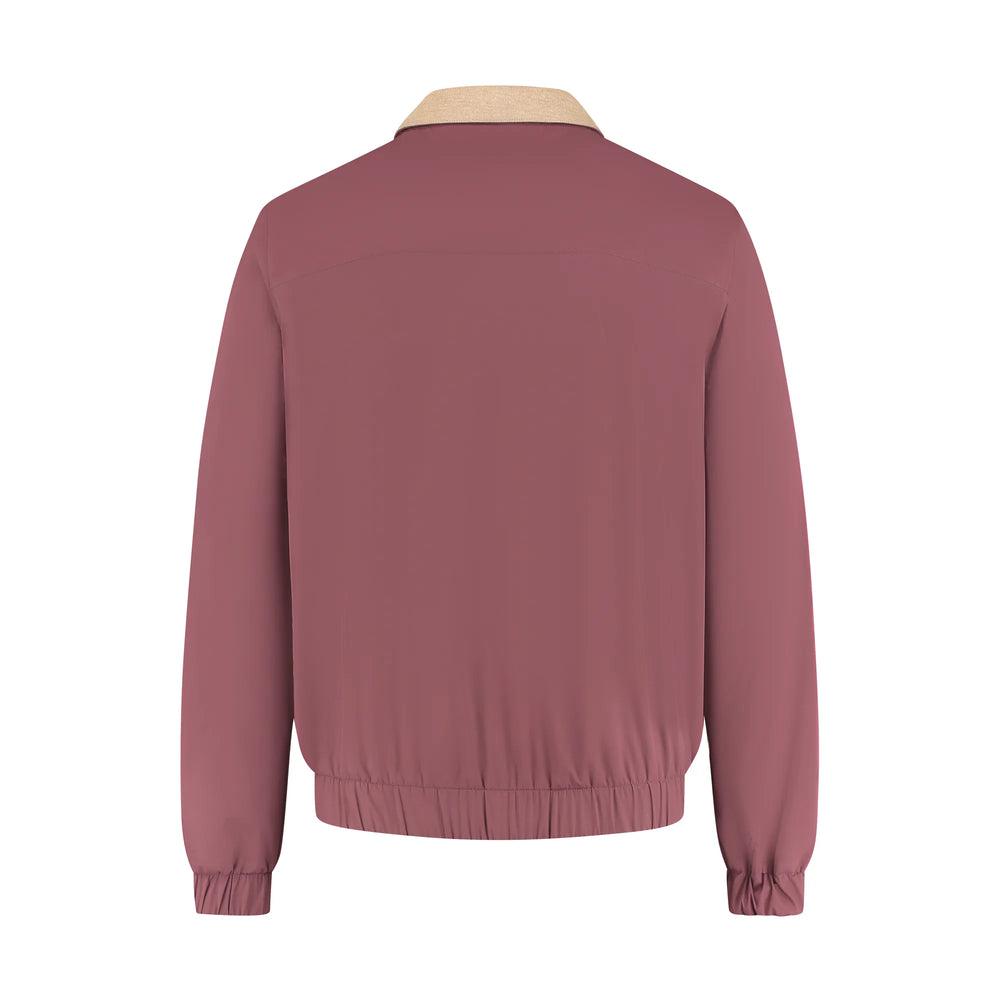 Pink jacket with beige collar on a white background