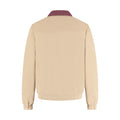 Beige jacket with a maroon collar on a white background