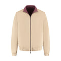 Beige jacket with a purple collar on a white background
