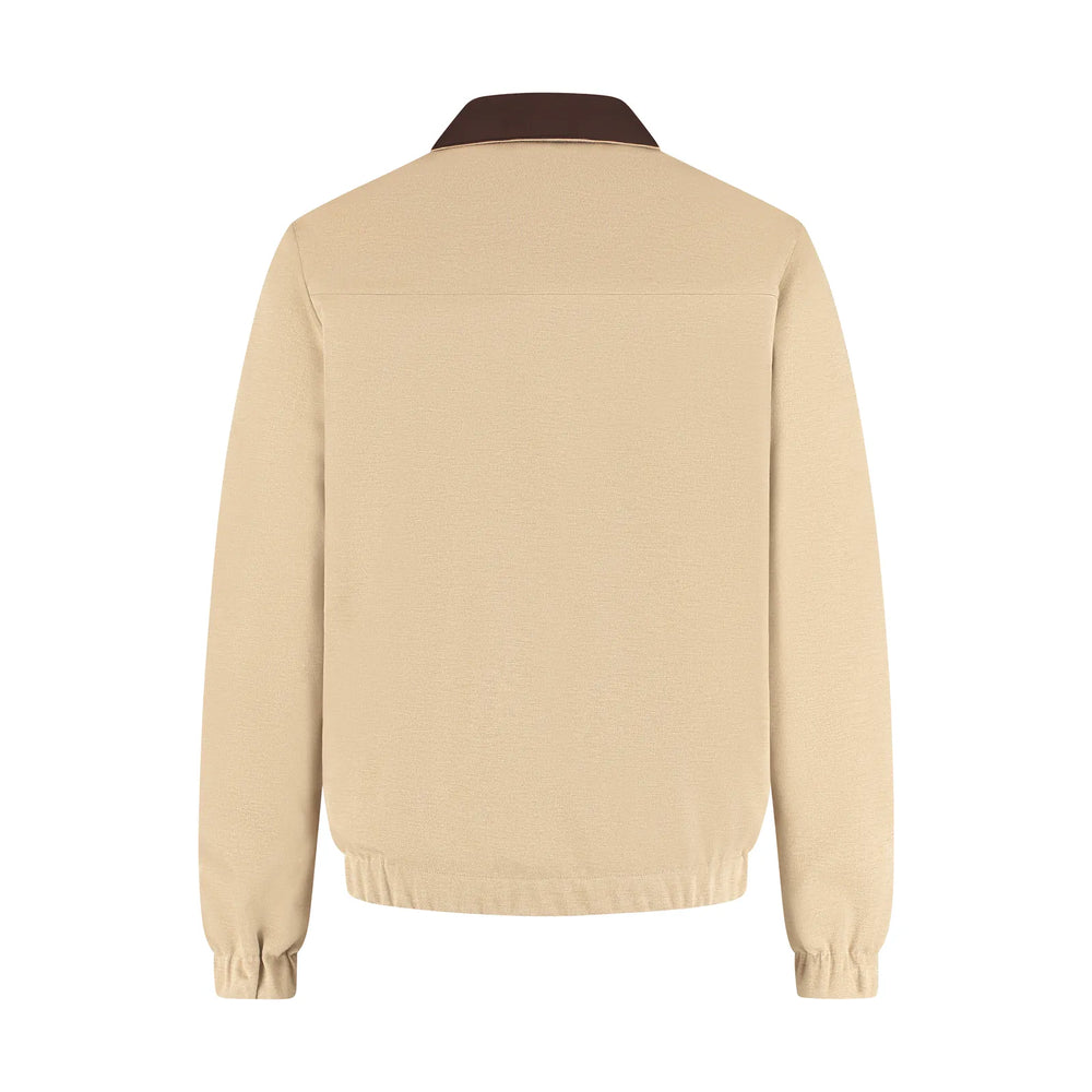Beige jacket with brown collar on a white background