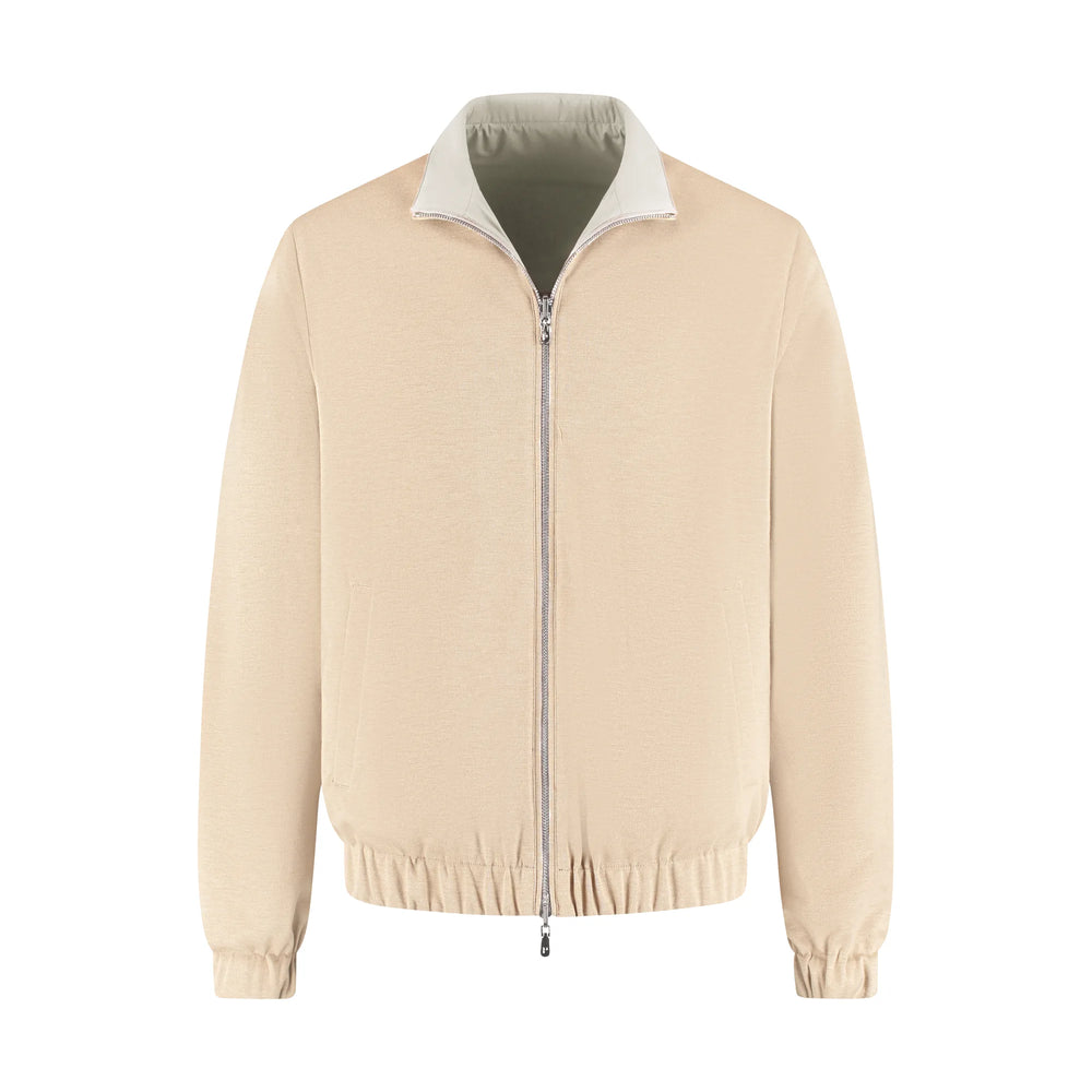 Beige jacket with a white collar on a white background