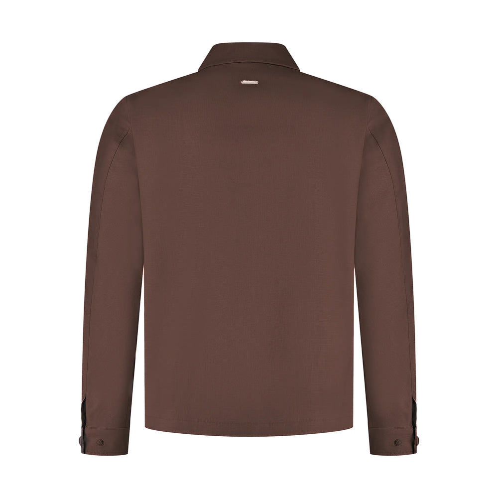 Brown jacket on a white background