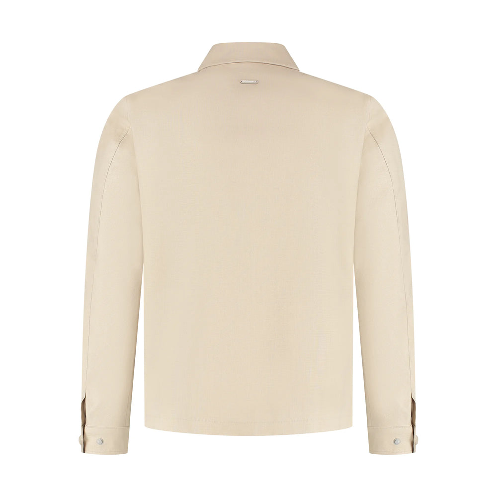 Beige shirt on a white background