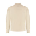Beige shirt on a white background