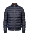 Navy blue puffer jacket on a white background