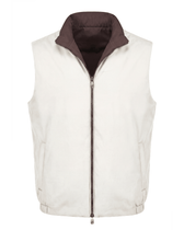 White puffer vest with brown collar on a white background