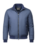 Blue jacket with a brand label on a black background