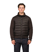 Man wearing a brown puffer jacket 