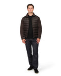 Man wearing a brown puffer jacket