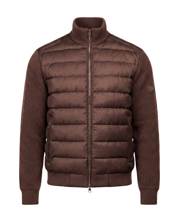 Brown puffer jacket on a black background
