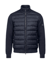Blue puffer jacket on a black background
