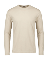 Beige long-sleeve shirt on a black background