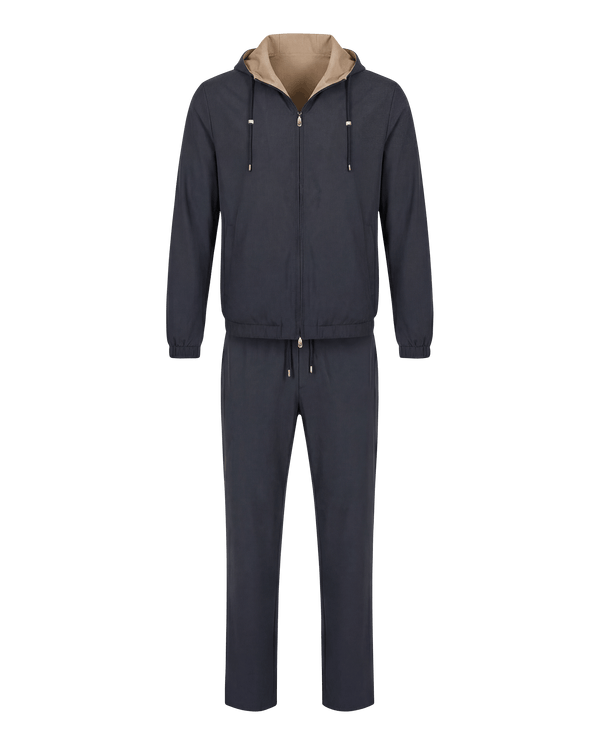 Navy tracksuit with beige hood on a white background
