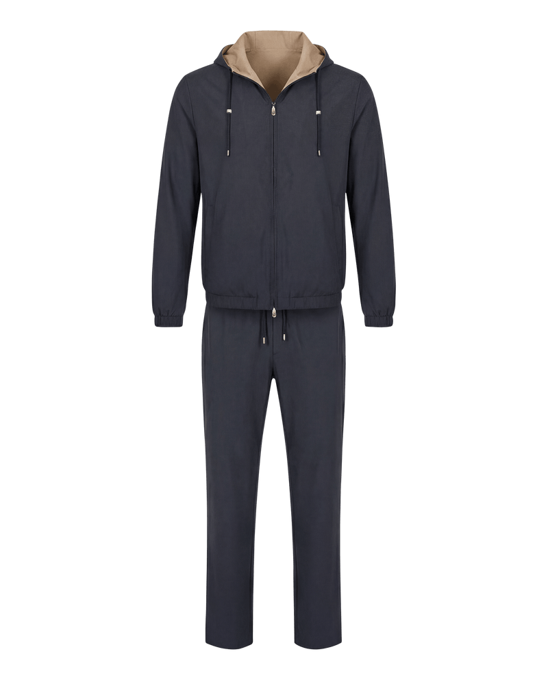 Navy tracksuit with beige hood on a white background