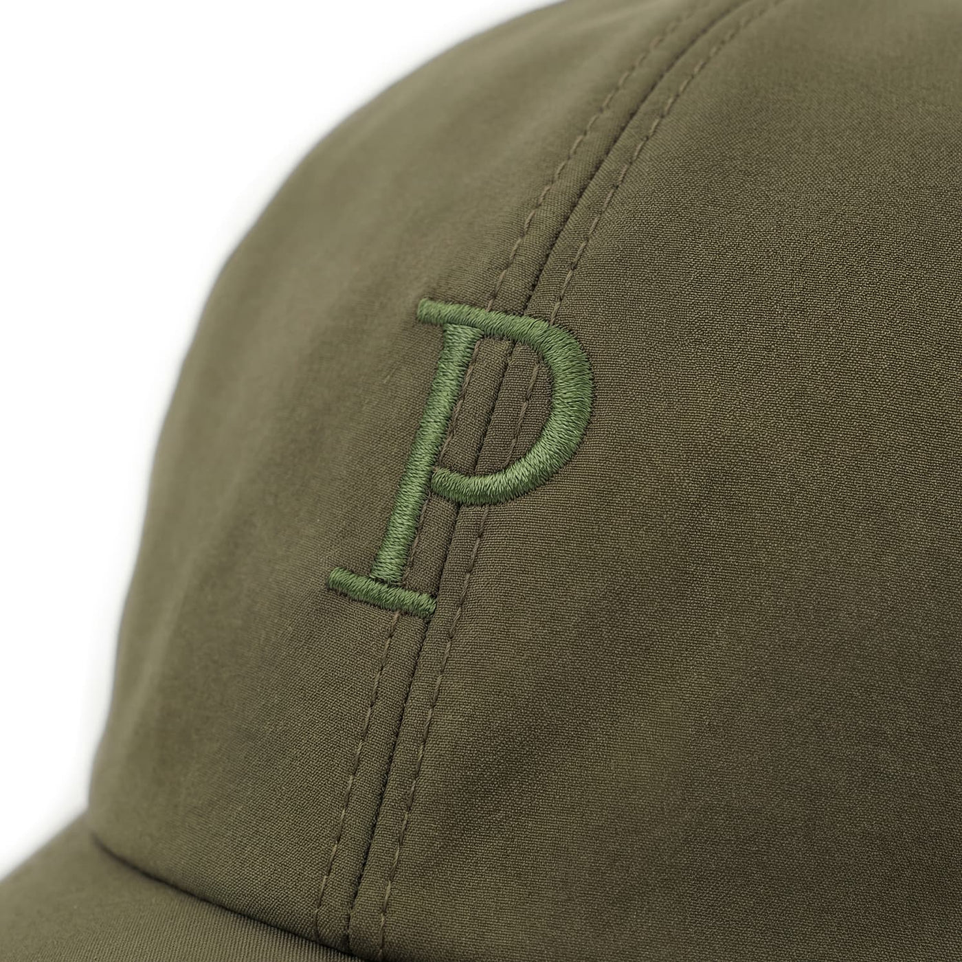 Green cap with a logo on a white background
