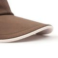 Close-up of a brown shoe sole on a white background