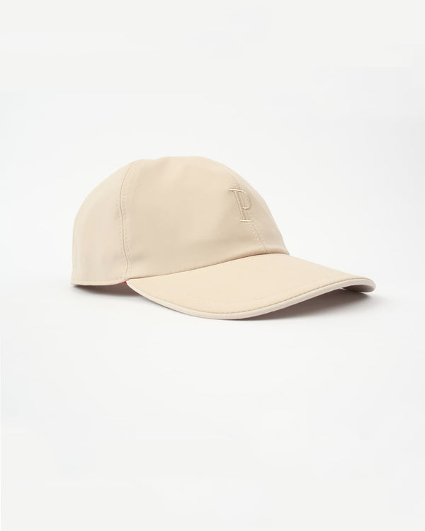 Beige hat with minimalist design, front view showing overall shape and style.
